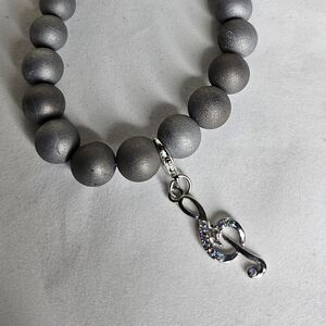 Gray Beaded Bracelet with Treble Clef Charm